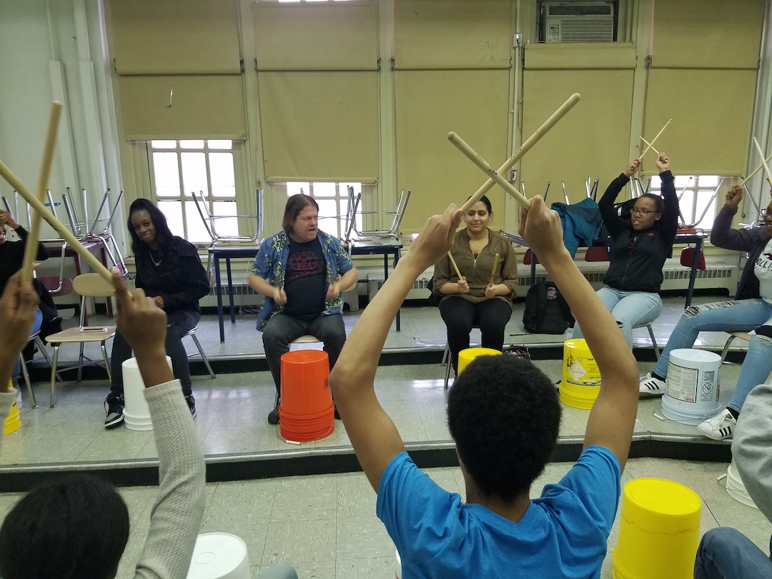 students drumming