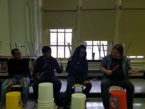 students drumming